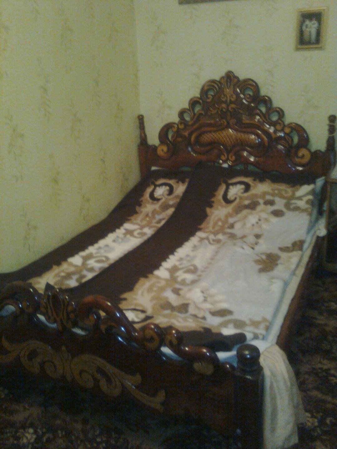Antique-Inspired Pine Bed by Vasyl Baranov — view 1